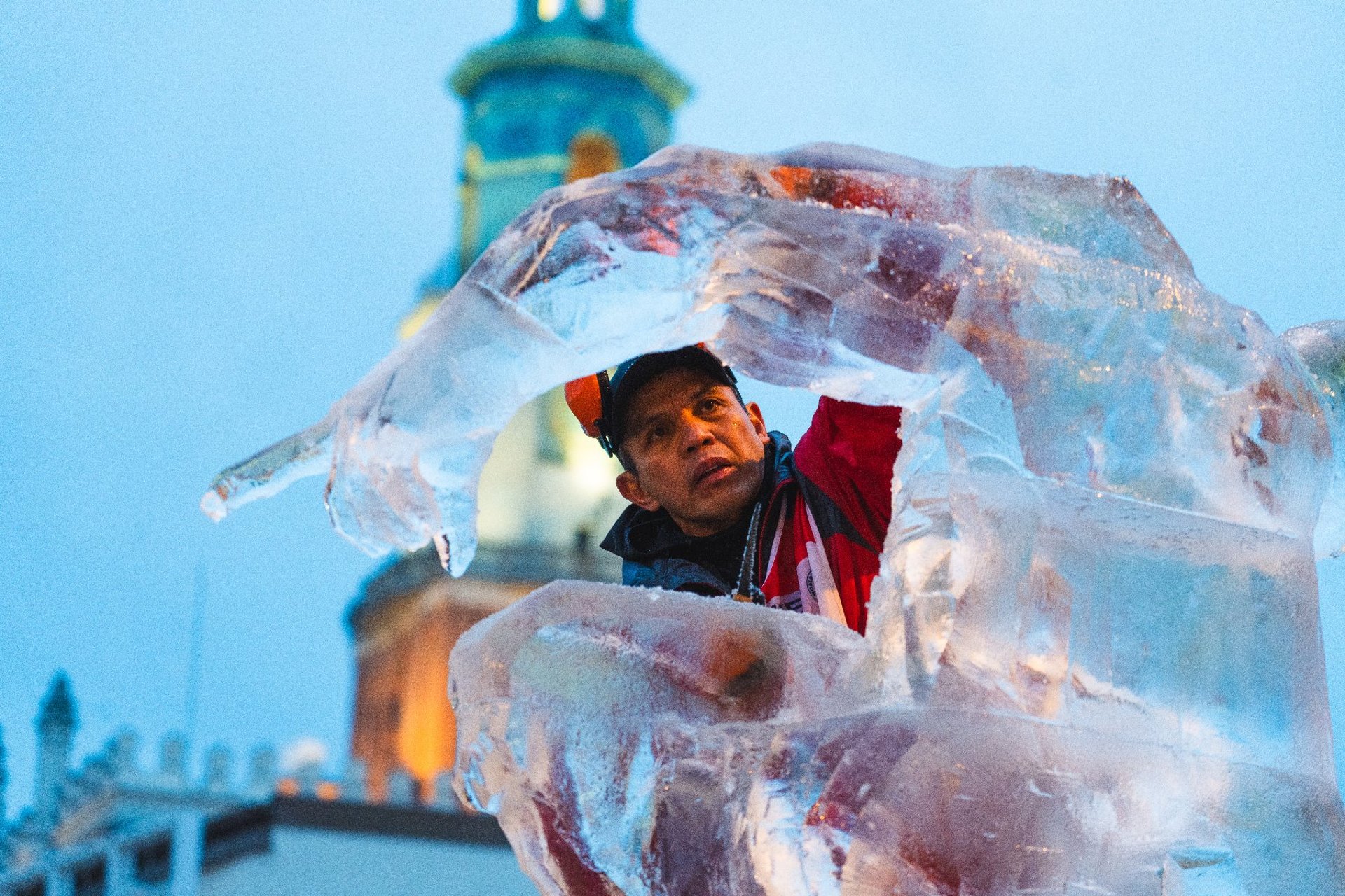 sculptor with the town hall in the background
